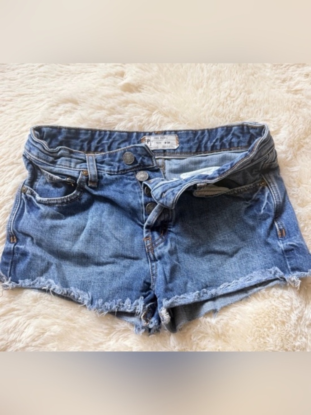 Free People Denim Cutoff Shorts in Medium Blue